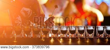 Bartender Fills Glasses Stack Cooks A Lot Of B52