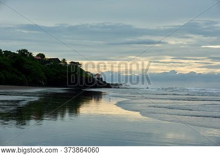 Playa El Cuco Is A Quintessential El Salvador Beach Town. Its Dark Sands Are Lined With Vendor Huts 