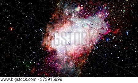 Hubble Views Galaxy And Nebula. Elements Of This Image Furnished By Nasa.