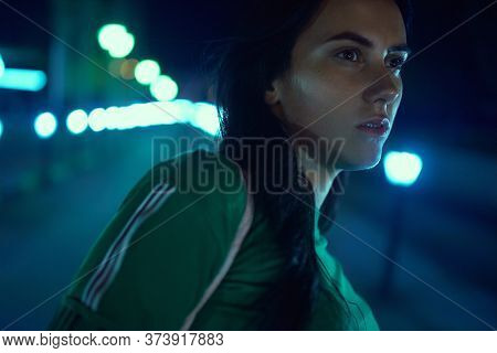 Girl Posing In Night On The Parking Of Trading Center
