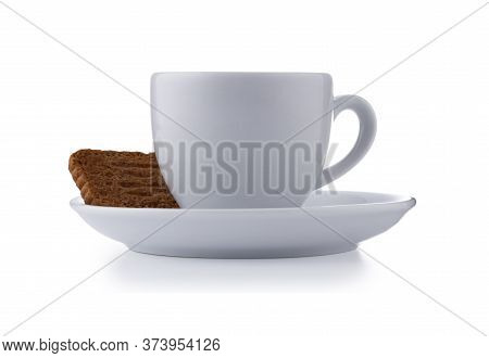 White Expresso Cup And Saucer Full Of Smooth Expresso Coffee, With A Biscuit, Isolated On White With