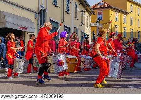 Cantu, Italy - February 25, 2023: Carnival Parade, Musician Band, And Crowd, In Cantu, Lombardy, Nor
