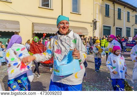 Cantu, Italy - February 25, 2023: Carnival Parade, Dancers Group, And Crowd, In Cantu, Lombardy, Nor