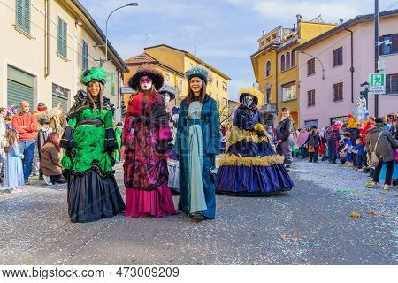 Cantu, Italy - February 25, 2023: Carnival Parade, With Displays And Participants In Costumes, In Ca