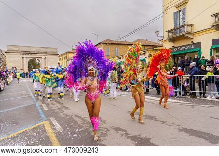 Crema, Italy - February 26, 2023: Carnival Parade, With Dancers In Costumes, And Crowd, In Crema, Lo