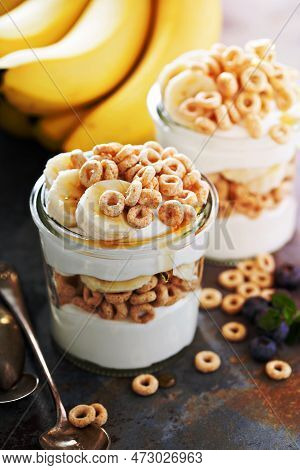 Yogurt Parfait With Cereal, Banana And Maple Syrup