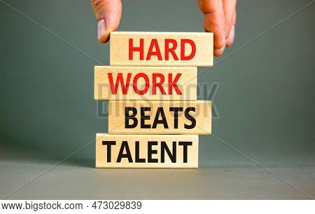 Hard Work Beats Talent Symbol. Concept Words Hard Work Beats Talent On Woodenblock. Beautiful Grey T