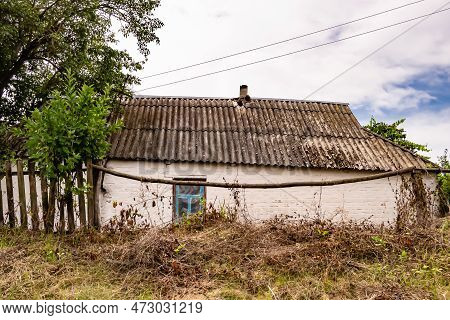 Beautiful Old Abandoned Building Farm House In Countryside On Natural Background