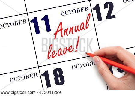 11th Day Of October. Hand Writing The Text Annual Leave And Drawing The Sun On The Calendar Date Oct