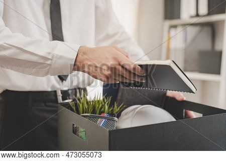 Unemployed, Quite Job. Desperate Caucasian Young Businessman Resigning From Company, Hand Holding St