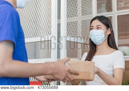 Asian Young Woman, Client Received A Delivery Of Cardboard Box, Parcel From Delivery, Postman, Weari