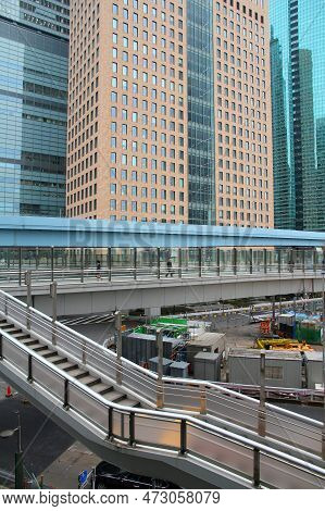 Tokyo, Japan - April 13, 2012: People Visit Shiodome District In Tokyo. Shiodome Is An Area Of Minat