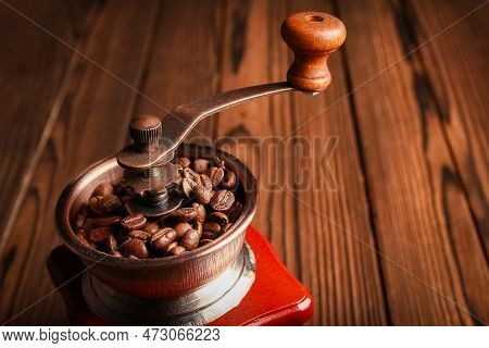 A Coffee Grinder And Coffee Background A