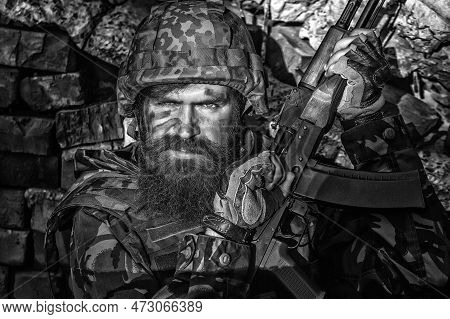 Russian Or Ukrainian Soldiers With Rifle. Russia Vs Ukraine Soldier. Ukraine War. Military Conflict,