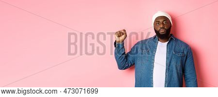 Serious And Confident African-american Male Activist, Raising Fist, Support Black Lives Matter Blm M