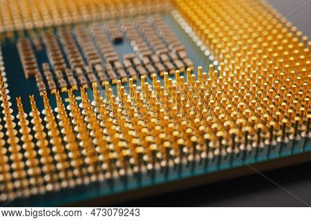 Microprocessor Of Computer Close-up. Cpu, Semiconductor, Pins And Connectors. Electronic And Computi