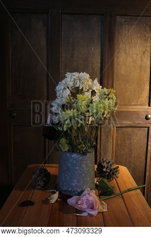 The Flowers Are Starting To Wither In A Vase