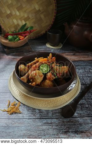Chicken Feet And Meatballs Cooked With Chilies And Spices