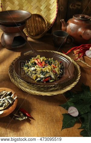 Salted Anchovies Cooked With Papaya Leaves And Chilies