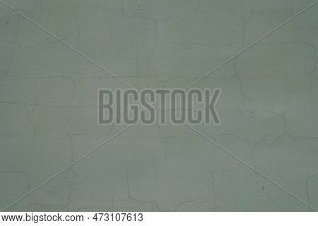 Texture Of Dark Subdued Green Painted Wall With Cracks