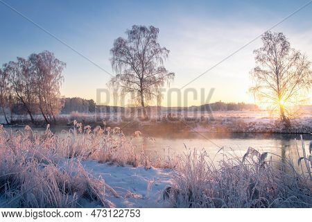 Beautiful Landscape Of Nature In Earky Spring. Sunrise On River, Everything Covered Snow. Sunbeams I