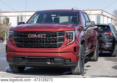 Gmc Sierra 1500 Pickup Display At A Dealership. Gmc Offers The Sierra In Hd, Hd Pro, At4 And Denali