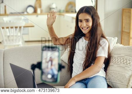 Girl Blogger Sit On Sofa Greeting Virtual Friends, Record Video For Vlog, Make Call, Lead Stream Wit