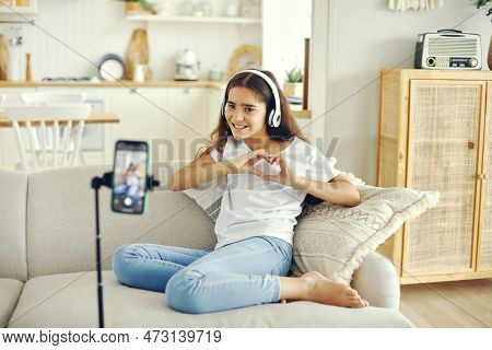 Preteen 12s Girl Blogger Record Video For Vlog, Showing Heart Sign, Make Call, Lead Stream With Frie