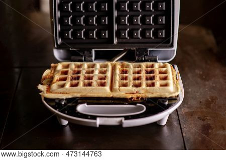 Cooking Waffles Stuffed With Sausage, Cheese. Pizza Waffle, Piffle.