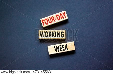Four-day Working Week Symbol. Concept Words Four-day Working Week On Wooden Block On A Beautiful Bla