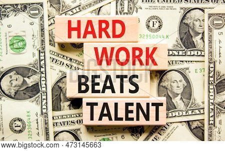 Hard Work Beats Talent Symbol. Concept Words Hard Work Beats Talent On Wooden Block. Beautiful Backg