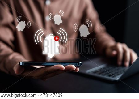 Businessman Showing Notification Bell Button Via Smartphone App Alerts Bell Ringing For Application 