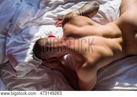 Sexy Male Round Buttocks, Sexy Shape Butt. Muscular Hunk. Naked Man Model In Bed. Gay Sexy Model. Pe