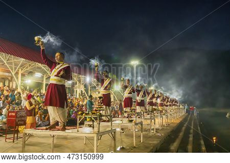 Tribeni Ghat, Rishikesh, Uttarakhand - 29th October 2018 : Ganga Aarti Being Performed By Hindu Prie