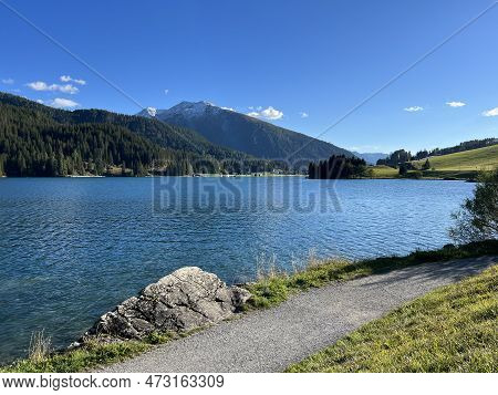 Sports And Recreational Trail Along The Alpine Lake Davos Or Loop Around Mountain Lake Davosersee, D