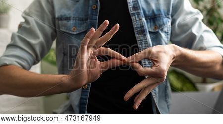 Sign Language Interpreter Man Translating A Meeting To Asl, American Sign Language. Empty Copy Space