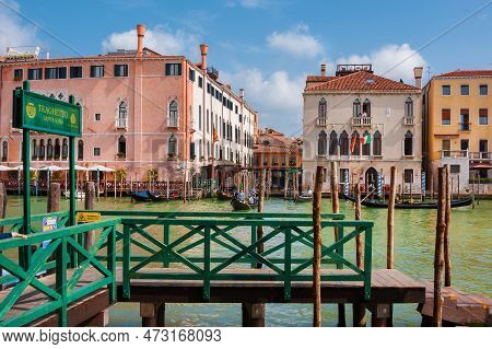 Venice, Italy - April 22: Tourists Cross Grand Canal In Venice On Gondola Traghetto (ferry) In Rialt