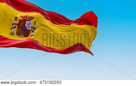The National Flag Of Spain Waving In The Wind In A Clear Day. European Country. Three Horizontal Str