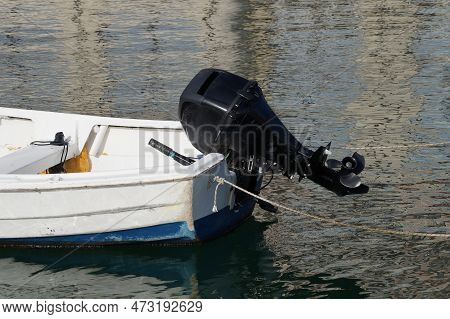 Stern Of A Small Boat With A Motor On The Water Close-up