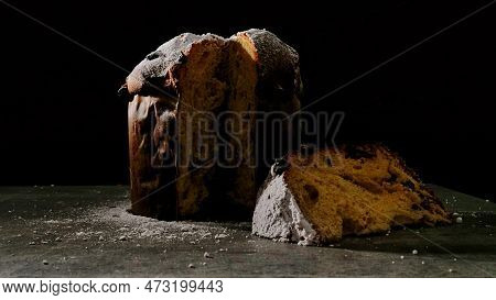 Panettone With Dried Fruits On Black Background, Selective Focus
