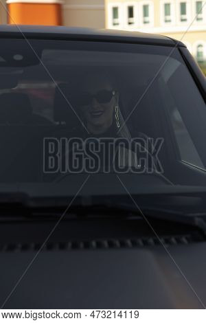Of Pretty Young Woman Driving Cabriolet. Happy Girl Smiling, Looking At Roal