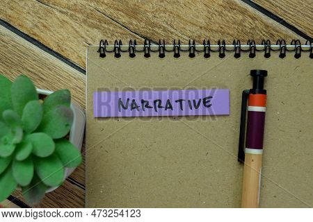 Concept Of Narrative Write On Sticky Notes Isolated On Wooden Table.