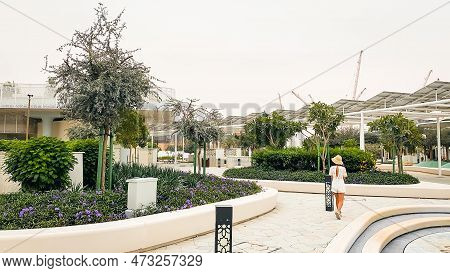 Uae, Abu Dhabi - 13th March, 2023: Tourist Visit Walk In Masdar City Central Park . Worlds Most Sust