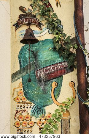 Alcochete, Lisbon, Portugal- November 21, 2022: Rusty Bell On Typical Facade In Alcochete Town, Lisb