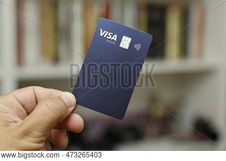 Minas Gerais, Brazil - March 18, 2023: Visa Infinite Logo On Credit Card. Digital Payment System.