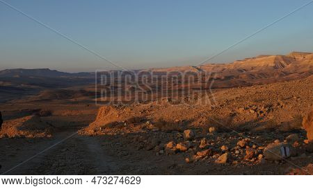 Negev Desert Landscape At Sunrise On The Bottom Of The Crater Makhtesh Gadol, In The South Of Israel