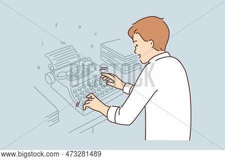 Motivated Male Writes Sit At Desk Typing On Retro Typewriter. Smiling Man Author Write New Novel Or 