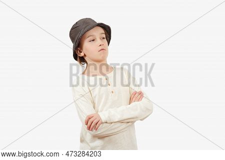Serious Boy Thinking Isolated On White Background. Positive Teen Boy Crossing Arms. Portrait Of Youn