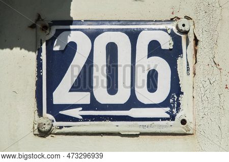 Weathered Grunge Square Metal Enameled Plate Of Number Of Street Address With Number 206