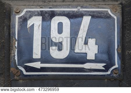 Weathered Grunge Square Metal Enameled Plate Of Number Of Street Address With Number 194